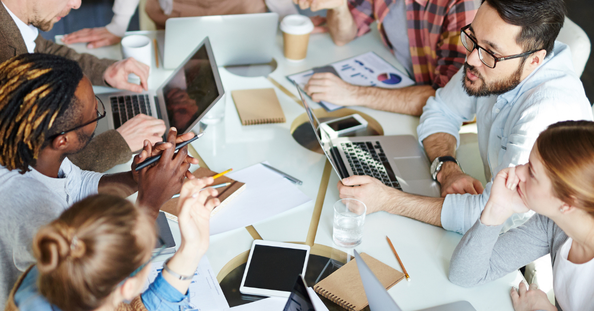 coworkers brainstorming at table